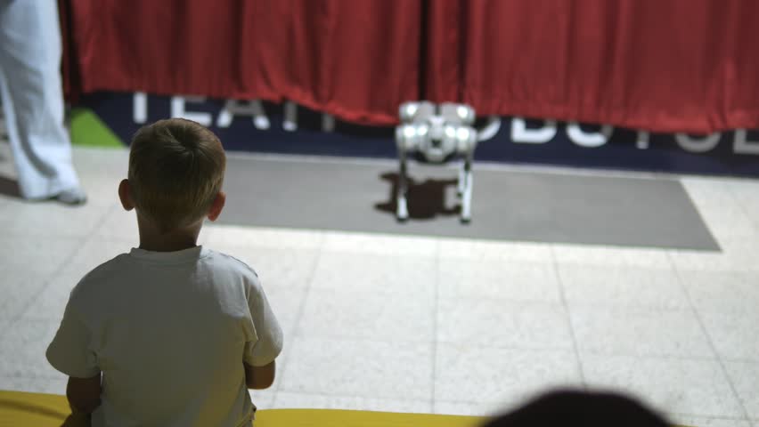 Robot Exhibition. Robot Dog. Concept of interaction between robot and human. 4K