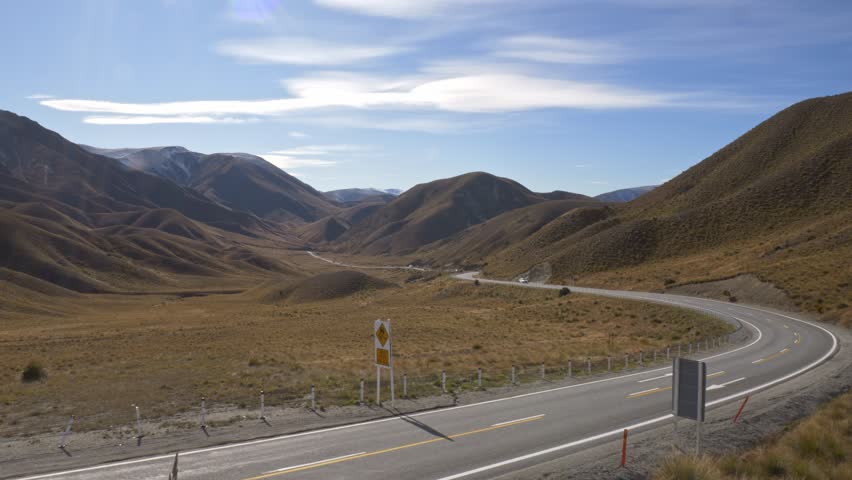 Hilly Landscape At Lindis Pass In South Island, New Zealand - Wide Shot