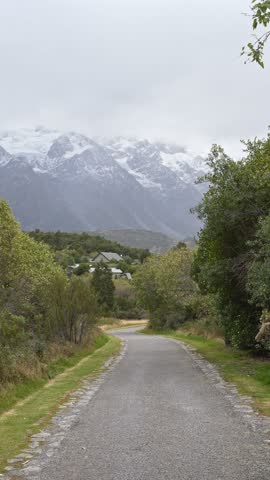 Scenic Road Leading To Mount Cook National Park In South Island, New Zealand - Vertical Shot