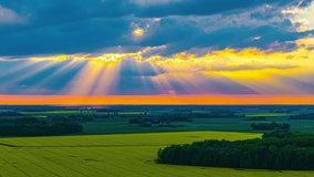 Sunrays Through The Clouds Over The Fields In The Countryside. - timelapse shot - Powered by Shutterstock - Get 15% off with code: PIKWIZARD15