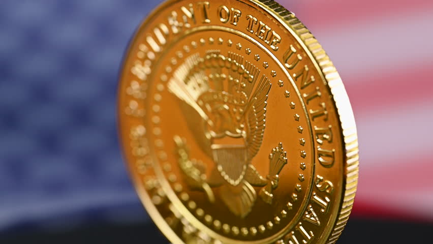 video of a coin with the president of America on the background of the American flag