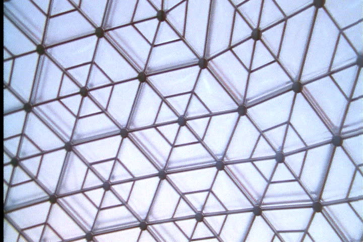 ST. LOUIS - CIRCA MARCH 2000: Time lapse of pattern in geodesic dome roof, clouds pass overhead and sky darkens and fades.