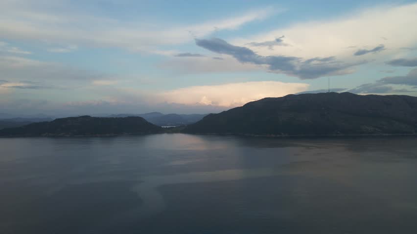 Aerial Drone View of Gandsfjorden and the North Sea with Mountains and Islands at Dusk


