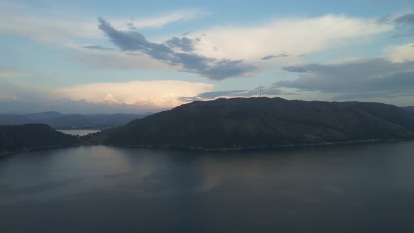 Aerial Drone View of Gandsfjorden and the North Sea with Mountains and Islands at Dusk

