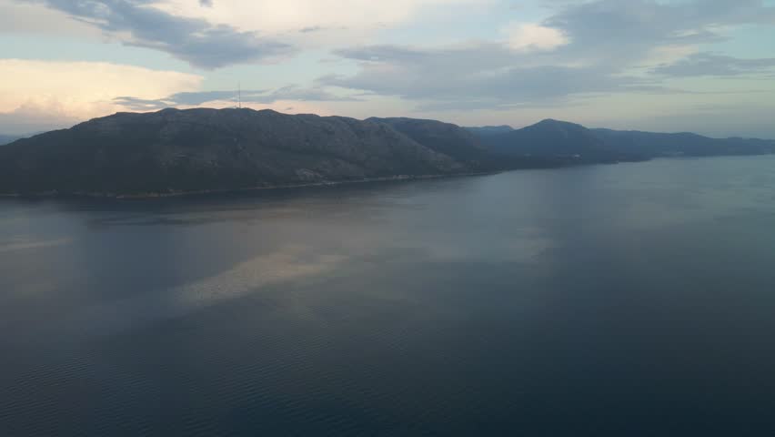 Aerial Drone View of Gandsfjorden and the North Sea with Mountains and Islands at Dusk

