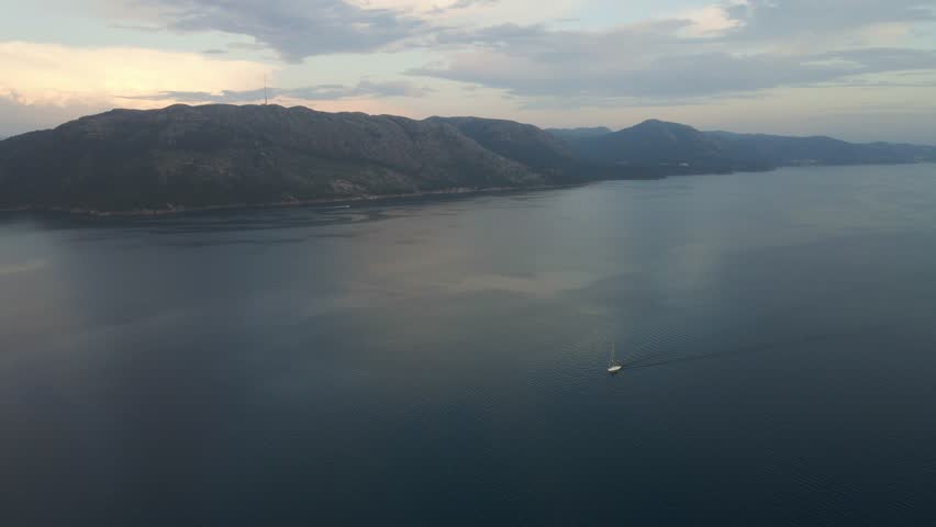 Aerial Drone View of Gandsfjorden and the North Sea with Mountains and Islands at Dusk

