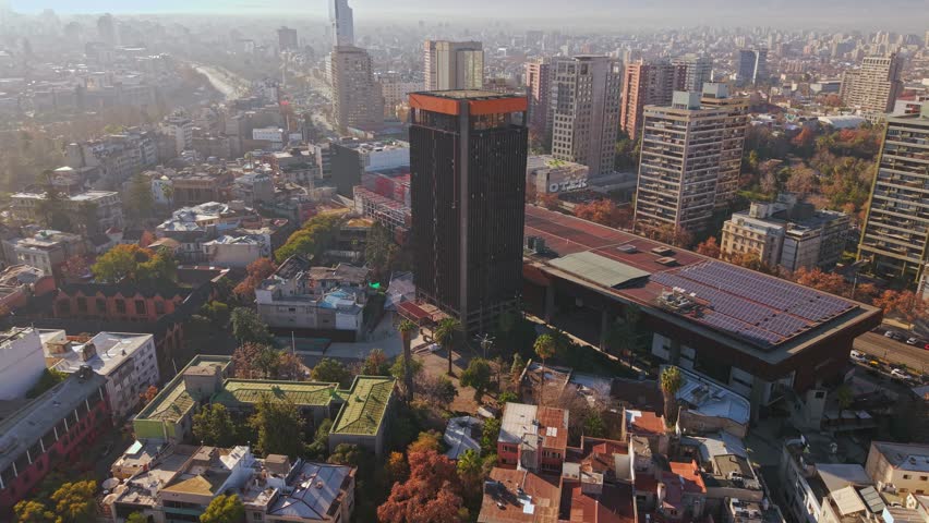 Aerial establishing drone fly Santiago de Chile, at daylight, cityscape with Gabriela Mistral Art Center
