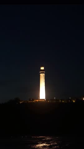Biarritz Lighthouse at night with warm lighting. Basque Country of France.
