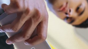 The video features a young male commuter using his mobile phone while travelling in a bus the bus is shown travelling through a cityscape, with the various buildings and landmarks visible in the - Powered by Shutterstock - Get 15% off with code: PIKWIZARD15