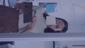 Animation of network of media icons over diverse casual business colleagues brainstorming at office. Connection, business, network, teamwork and communication, digitally generated video. - Powered by Shutterstock - Get 15% off with code: PIKWIZARD15