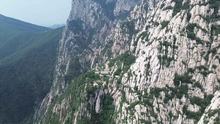Aerial video of Songshan Zen Temple in Dengfeng, China, which is built on the western foot of Shaoshi Mountain at an altitude of 1,200 meters in Songshan.