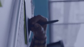 Animation of social media data processing over caucasian man using computer. Global computing, digital interface and data processing concept digitally generated video. - Powered by Shutterstock - Get 15% off with code: PIKWIZARD15