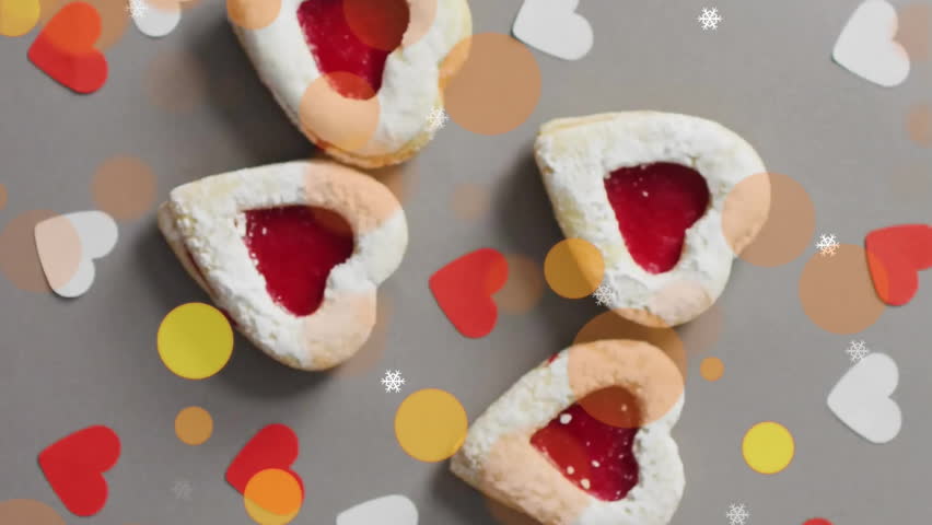 Heart-shaped cookies with jam filling over heart and bokeh animation. baking, dessert, sweet, Valentine