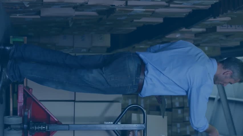 Discussing logistics, warehouse workers with data processing animation overlay in background. supply chain, teamwork, automation, data analysis, operations, management - Powered by Shutterstock - Get 15% off with code: PIKWIZARD15