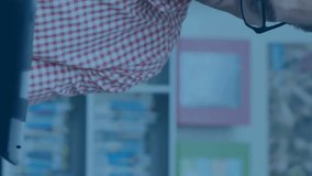 Using tablet, man processing digital order with animation graphics overlay. Technology, innovation, touchscreen, businessman, ecommerce, data - Powered by Shutterstock - Get 15% off with code: PIKWIZARD15