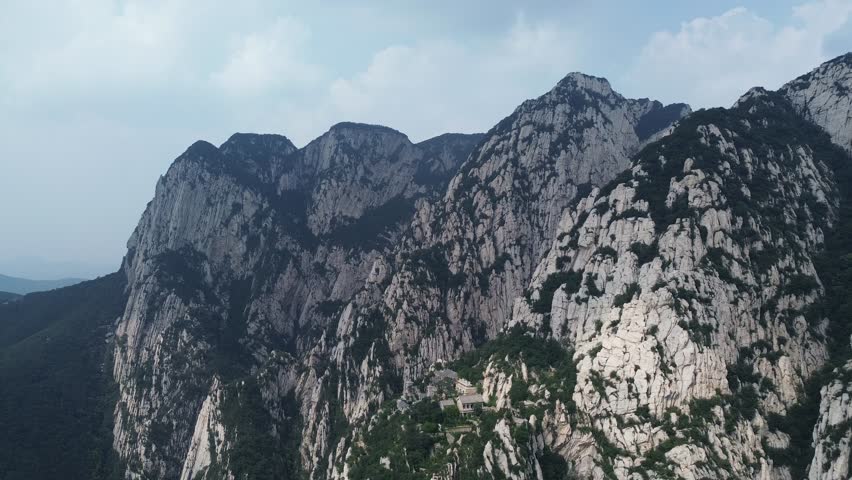 Aerial video of Songshan Zen Temple in Dengfeng, China, which is built on the western foot of Shaoshi Mountain at an altitude of 1,200 meters in Songshan.