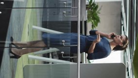 Talking on smartphone, businesswoman in office with data processing overlay. technology, communication, professional, corporate, workplace, digital - Powered by Shutterstock - Get 15% off with code: PIKWIZARD15