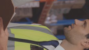 Animation of financial data processing over two diverse warehouse worker. global shipping, delivery, business, data processing and technology concept digitally generated video. - Powered by Shutterstock - Get 15% off with code: PIKWIZARD15