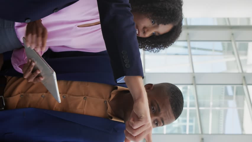 Animation of pie charts, globes, computer language, diverse coworkers sharing ideas on tablet. Digital composite, multiple exposure, report, business, globalization, teamwork, coding, technology. - Powered by Shutterstock - Get 15% off with code: PIKWIZARD15