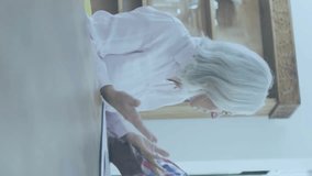 Animation of financial data processing over senior caucasian couple using laptop. Global finance, business, connections, computing and data processing concept digitally generated video. - Powered by Shutterstock - Get 15% off with code: PIKWIZARD15