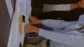 Animation of financial data processing over diverse business people in office. Global finance, business, connections, computing and data processing concept digitally generated video. - Powered by Shutterstock - Get 15% off with code: PIKWIZARD15