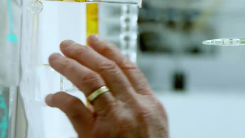 Animation of data processing with molecules and brains over caucasian male scientist working in lab. Global science, computing and digital interface concept digitally generated video. - Powered by Shutterstock - Get 15% off with code: PIKWIZARD15