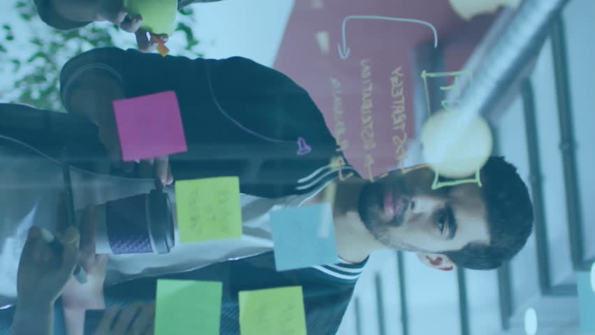 Collaborating in office, diverse team using animation with digital world map. Collaboration, teamwork, brainstorming, technology, innovation, diversity - Powered by Shutterstock - Get 15% off with code: PIKWIZARD15