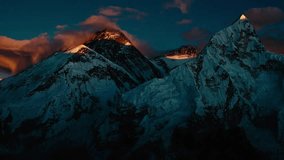 Beautiful view of the Snow-capped Mountains at sunrise. Amazing Sunlight touching the top of the Mountains. - Powered by Shutterstock - Get 15% off with code: PIKWIZARD15