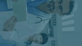 Animation of financial data processing over diverse doctors in hospital. Global medicine, connections, computing and data processing concept digitally generated video. - Powered by Shutterstock - Get 15% off with code: PIKWIZARD15