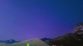 Stunning fireworks display over majestic mountains under a starry night sky, perfect for celebrations, holidays, and magical scenes. - Powered by Shutterstock - Get 15% off with code: PIKWIZARD15