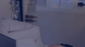 Two professionals discussing technology with cloud and gears animation overlay. innovation, cloud computing, collaboration, business, teamwork, digital - Powered by Shutterstock - Get 15% off with code: PIKWIZARD15