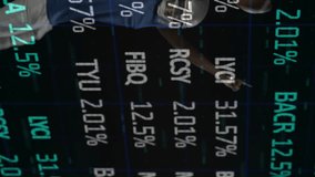Football player in action over stock market data and percentages animation. Sports, finance, business, trading, economy, competition - Powered by Shutterstock - Get 15% off with code: PIKWIZARD15
