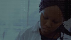 Medical researcher reading data feed by window blinds, pulsing waveform showing research insights. Scientist, data analysis, professional, modern, technology, research, focus - Powered by Shutterstock - Get 15% off with code: PIKWIZARD15