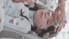 Animation of covid 19 cells over caucasian blonde mother measuring temperature her sick daughter. global covid 19 pandemic concept digitally generated video. - Powered by Shutterstock - Get 15% off with code: PIKWIZARD15