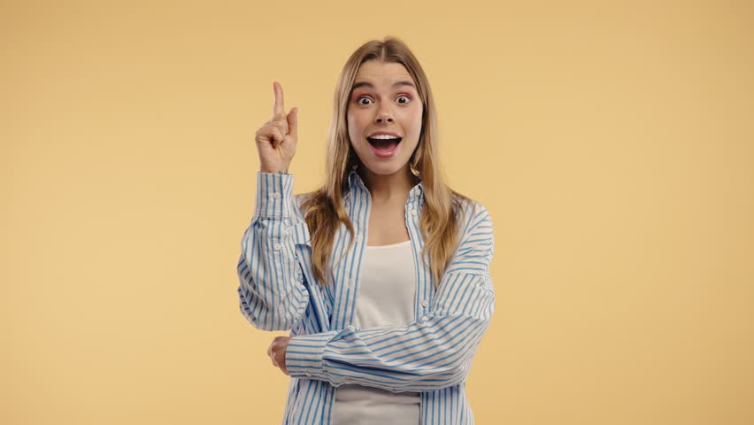 Breakthrough Genius Idea. Happy Blonde Woman Eureka Moment, Pointing Finger Up