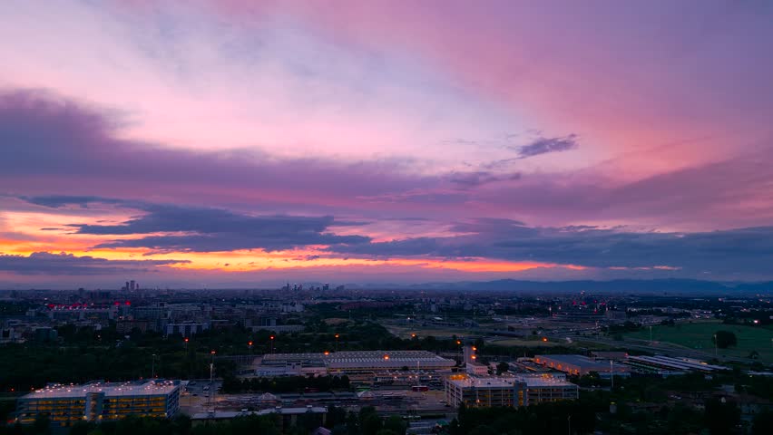 Romantic Sunset Over San Donato – Pink Clouds and Cityscape