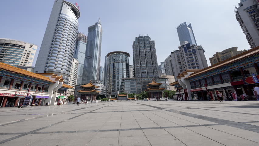CHONGQING, CHINA - 28 MAY 2025 : Timelapse of the multi level chongqing city in china, looking down from a public square