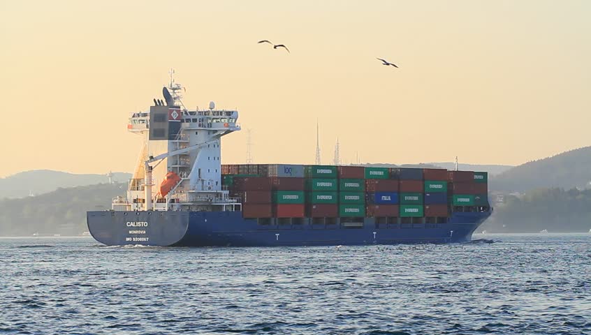 ISTANBUL - APR 27: Container ship CALISTO cruising northbound on the straits