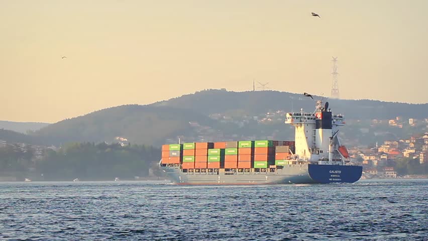 ISTANBUL - APR 27: (Timelapse View) Container ship CALISTO navigates a sharp