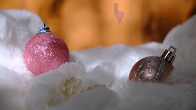 Christmas decorations and white pearls on white fluffy blanket, fireplace background, Copy space, template.	Atmospheric mood. Merry Christmas and Happy New Year - Powered by Shutterstock - Get 15% off with code: PIKWIZARD15