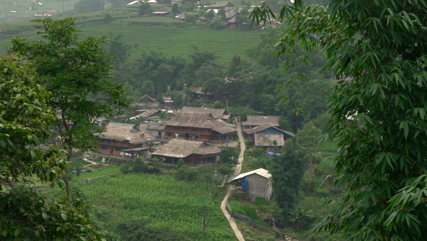 Hmong people ethnic village wood huts homes Sapa region of Vietnam Southeast Asia