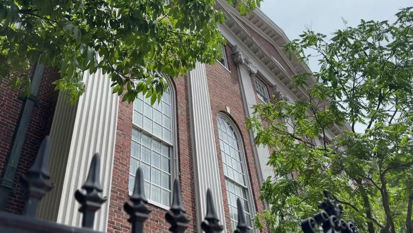 Harvard Building low angle from outside the gate