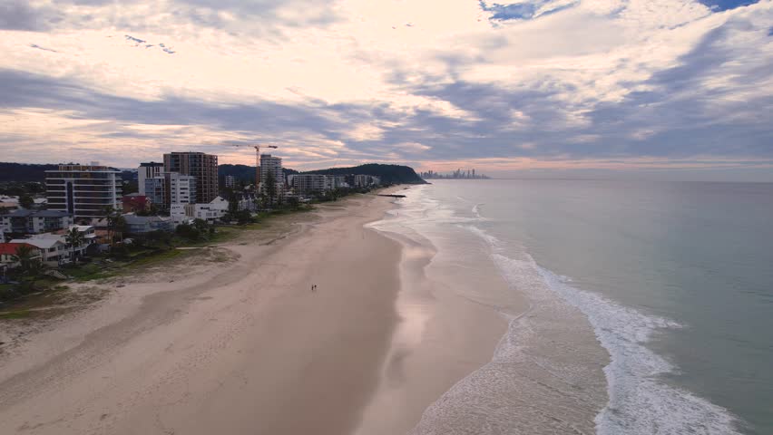 Aerial views of Palm Beach on the Gold Coast with skyline in the background, Queensland, Australia 