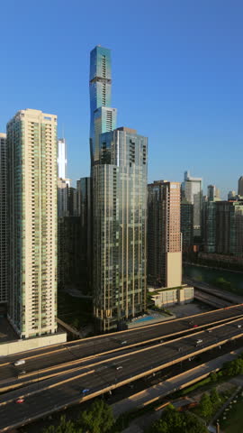 Explore breathtaking aerial shot of skyline of Chicago through stunning aerial drone footage that beautifully showcases its impressive architecture alongside the vibrant city life bustling below