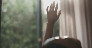 Hands, basking or person with sungazing in bedroom for vitamin D, playful interaction or imagination. Relax, woman or comfortable in sunlight in house for weekend break, peaceful morning or serotonin - Powered by Shutterstock - Get 15% off with code: PIKWIZARD15