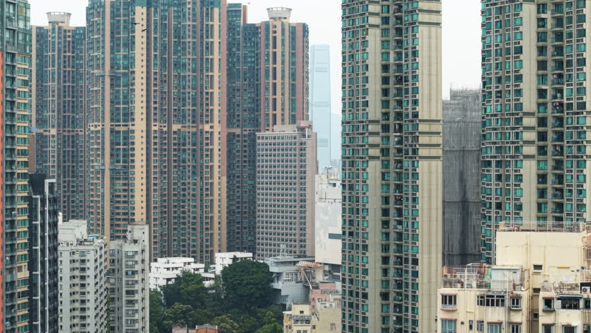 Dense Urban Landscape Of Hong Kong Revealing Residential Buildings, Architectural Diversity, And City Skyline. Crowded High-Rises. Representing City