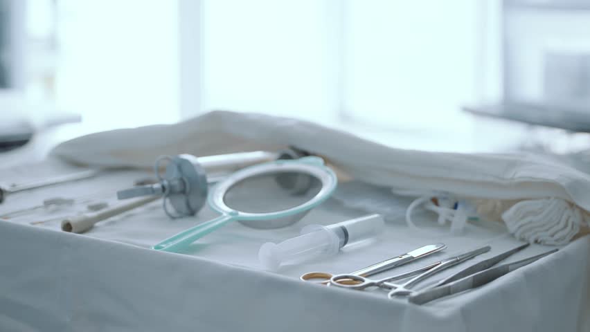 Surgical instruments for laparoscopy in prostate adenoma procedure.