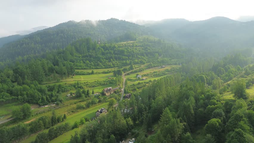 Peaceful countryside town near forest hills