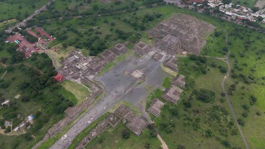 Drone shots of Pyramid of the Moon with people climbing, Teotihuacan, Mexico