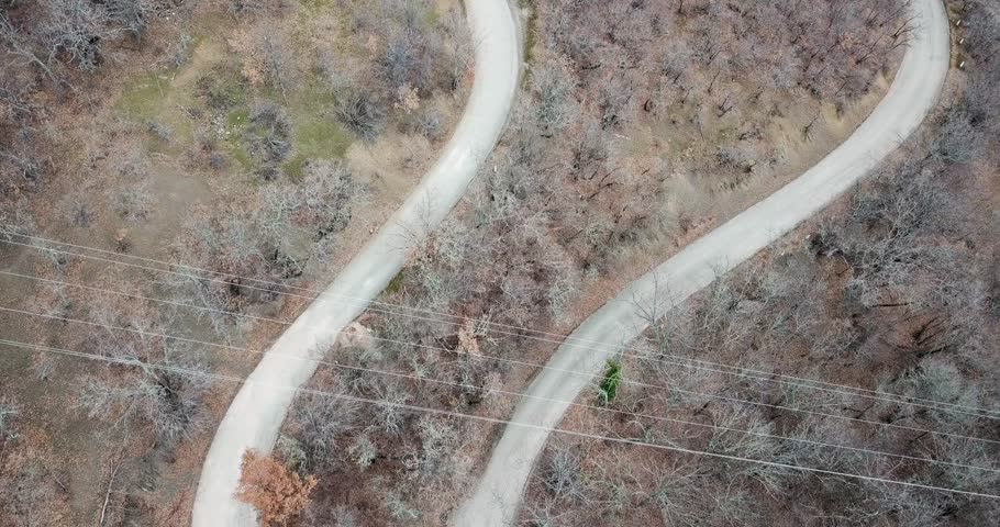 curved mountain road in spring
